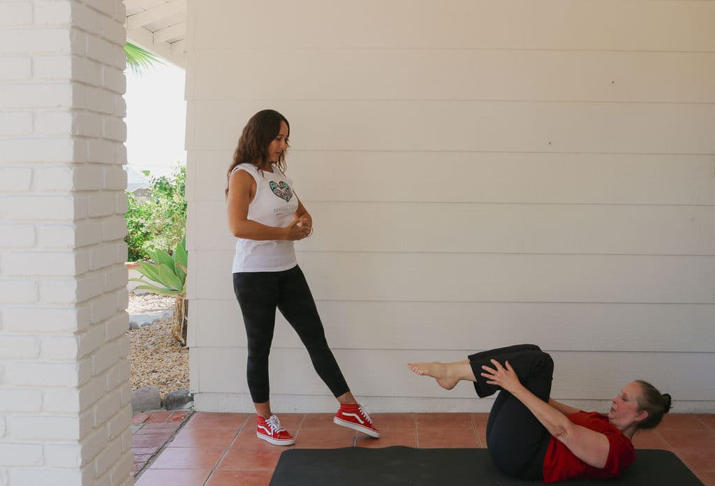 Tracey with a client doing classical Pilates 2